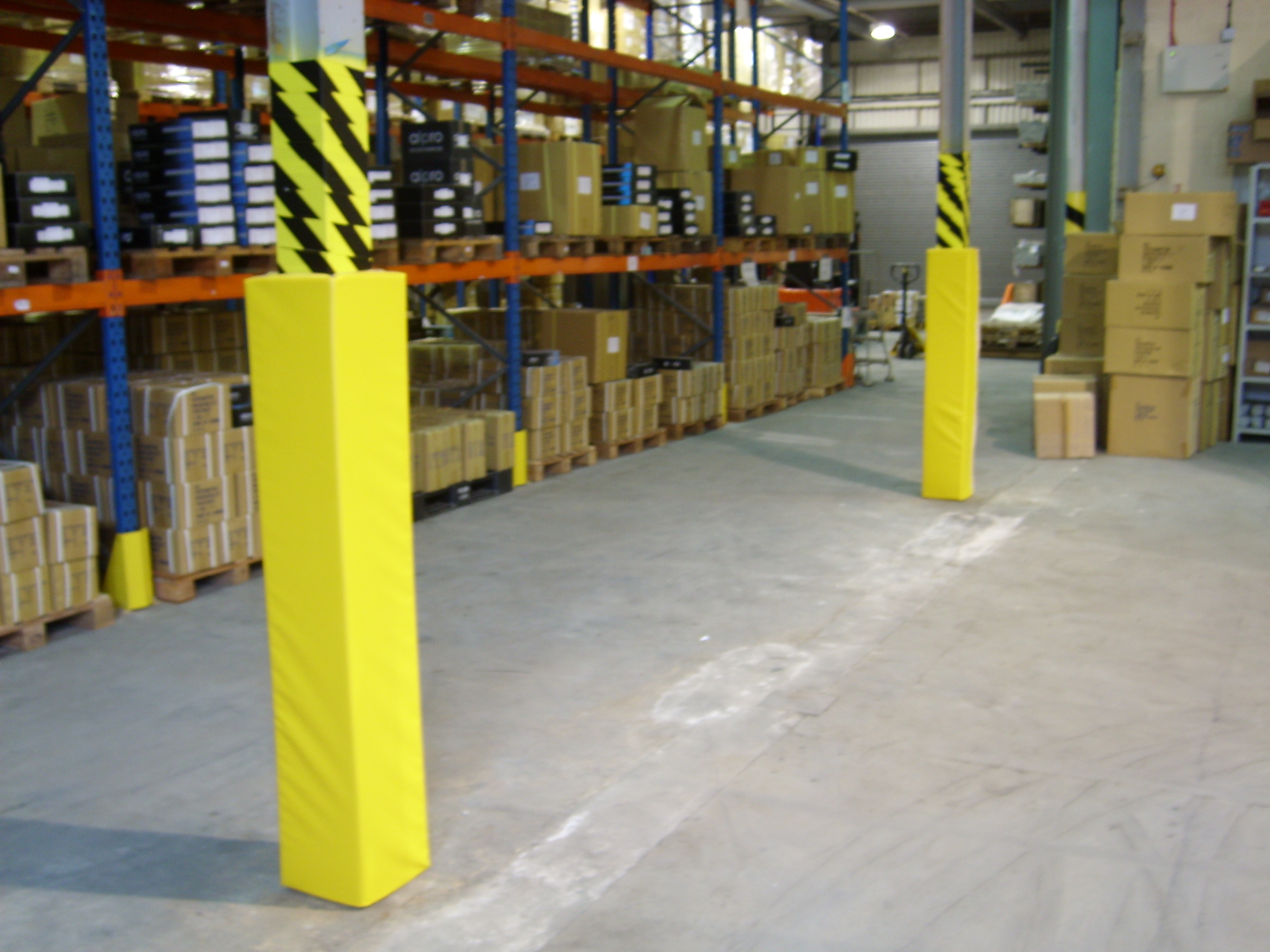 Padded post protection for warehouses