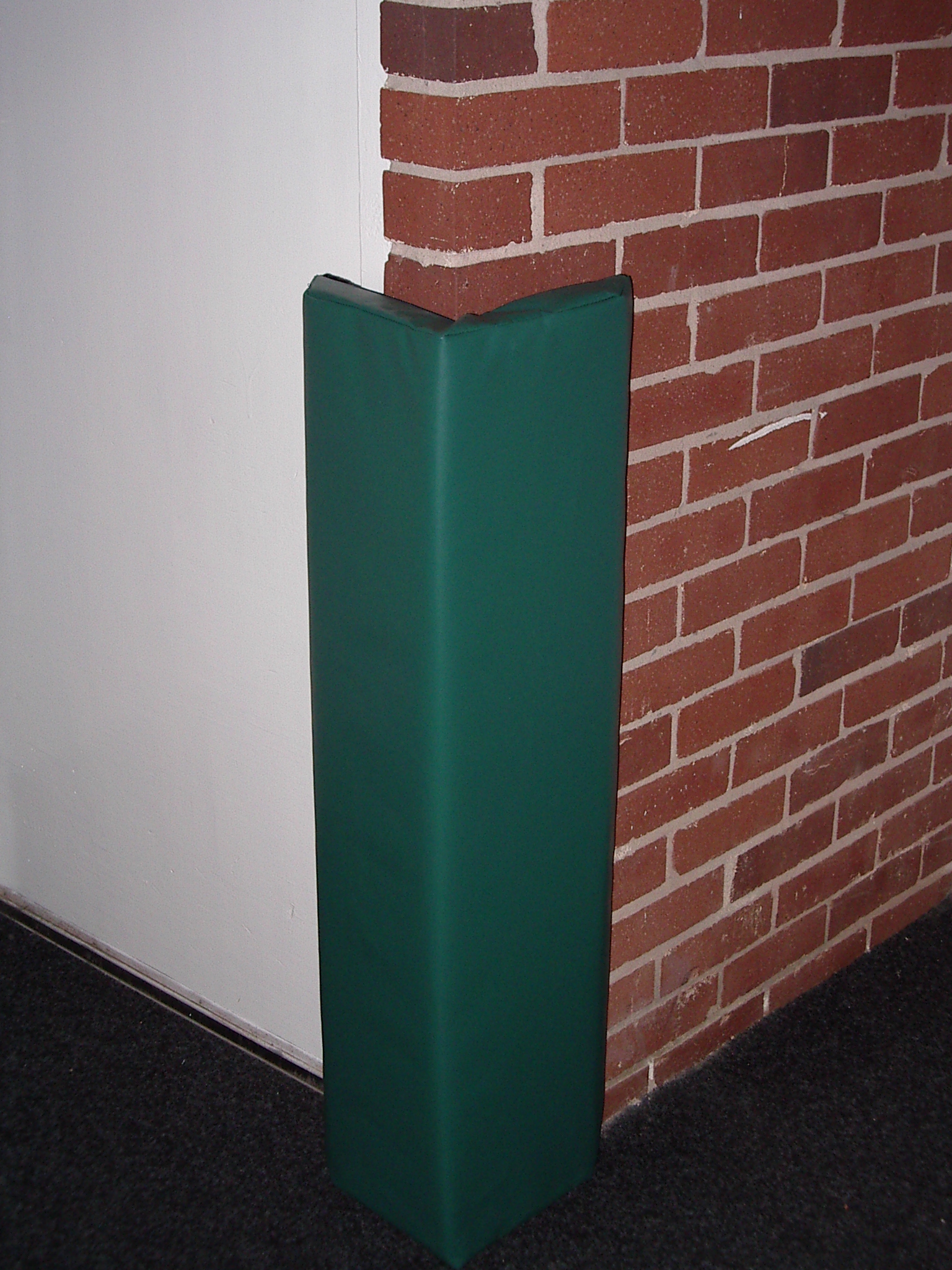 Two-sided corner wall padding